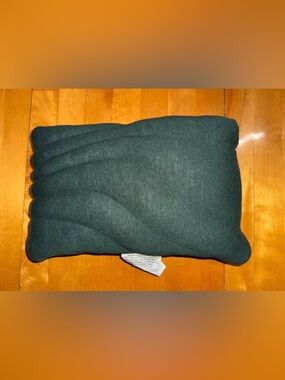 Dark green throw pillow